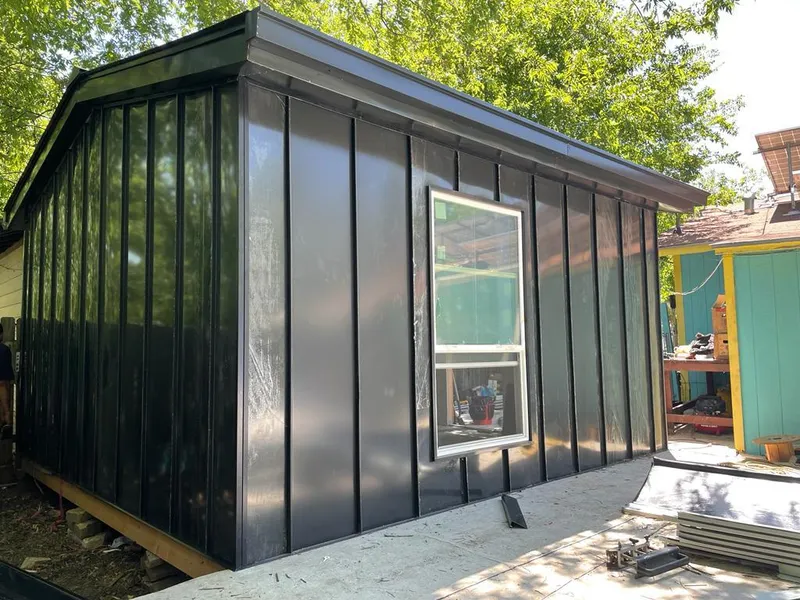 Black standing seam metal wall panels for Roof Inspection in Kilgore