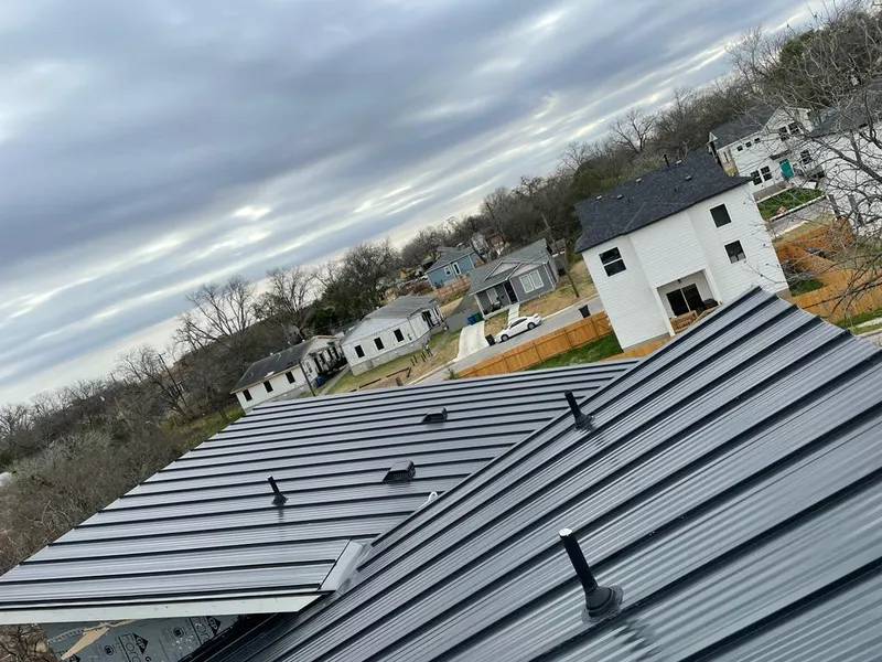 Standing seam metal roof panels with vents for Skylight Repair in Kilgore
